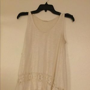 White flowing tank top style shirt